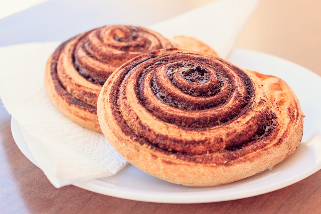 A plate of cinnamon rolls.